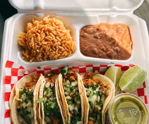 assorted tacos, rice and beans